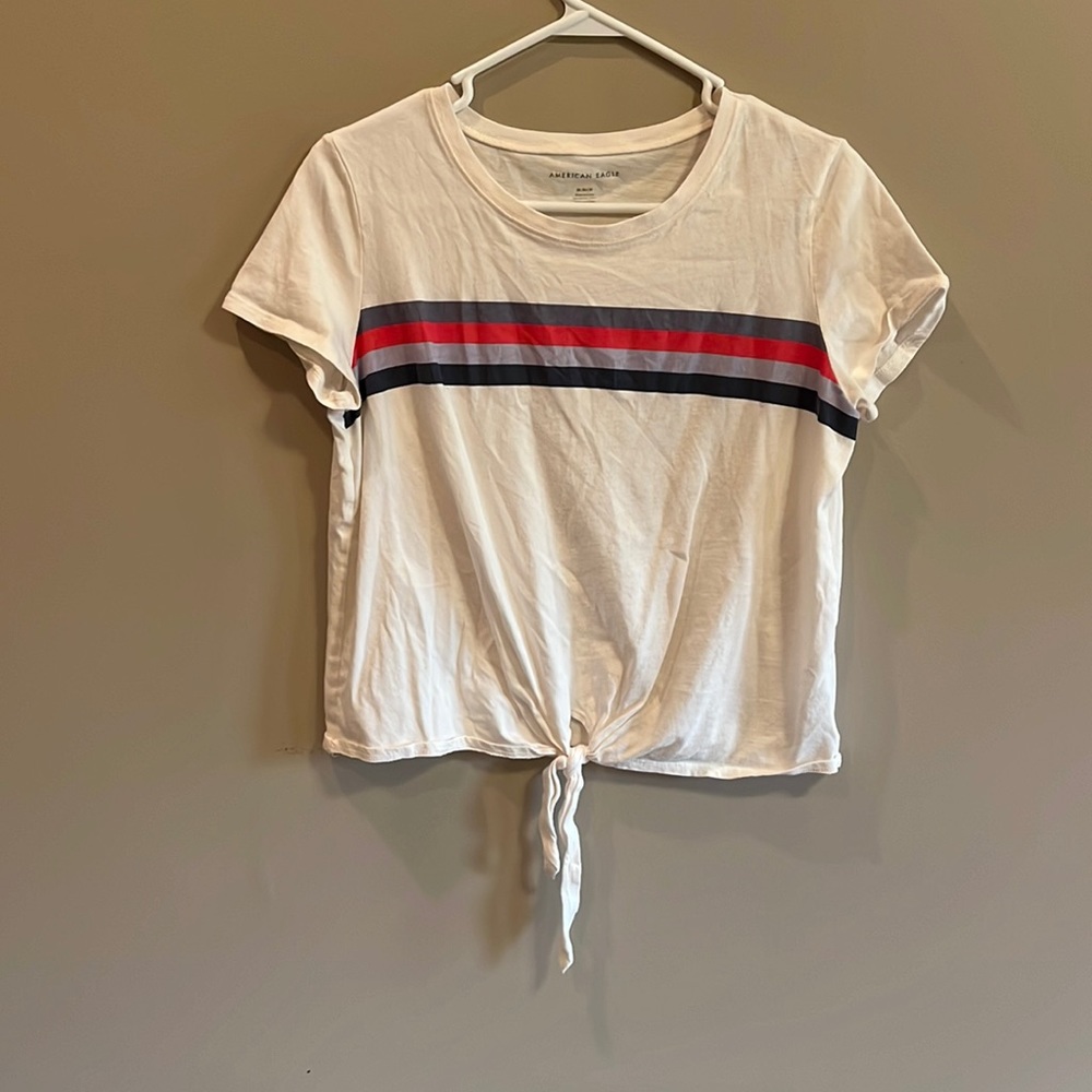 American Eagle Tee. White with blue and pink stripe. Tie in front. Size M